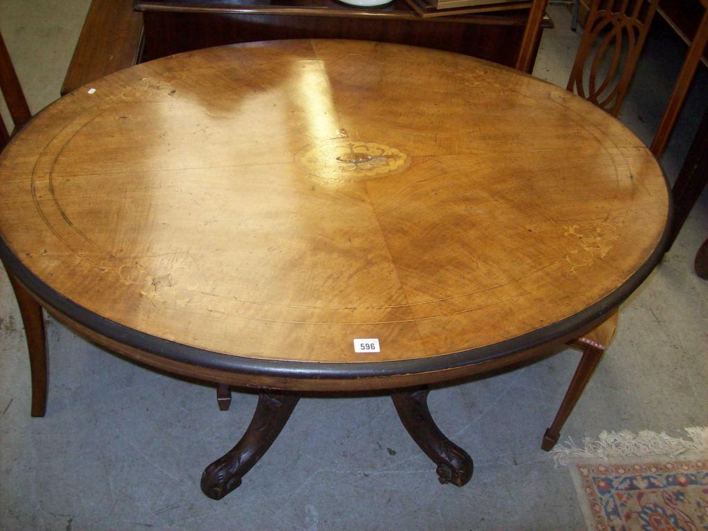 Appraisal: A Victorian walnut oval loo table -