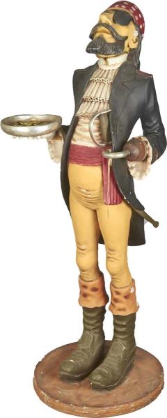 Appraisal: Tall Pirate Butler Holding Tray Of Golden Coins Pirate stands