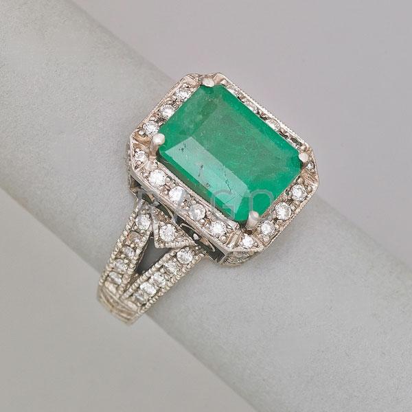 Appraisal: CONTEMPORARY EMERALD RING WITH DIAMONDS Condition Report