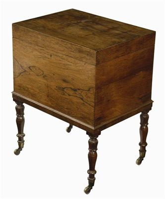 Appraisal: A rosewood Canterbury on stand the hinged top to an