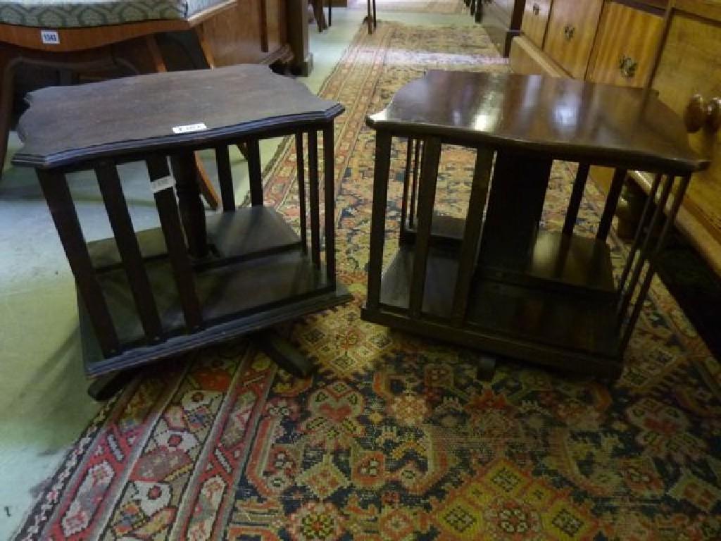 Appraisal: A pair of Edwardian table top revolving bookcases on quadruped