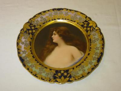 Appraisal: A VIENNA PORCELAIN PLATE painted with a maiden with long