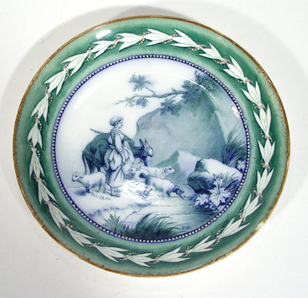 Appraisal: Victorian pottery plate transfer printed with flow blue scene of