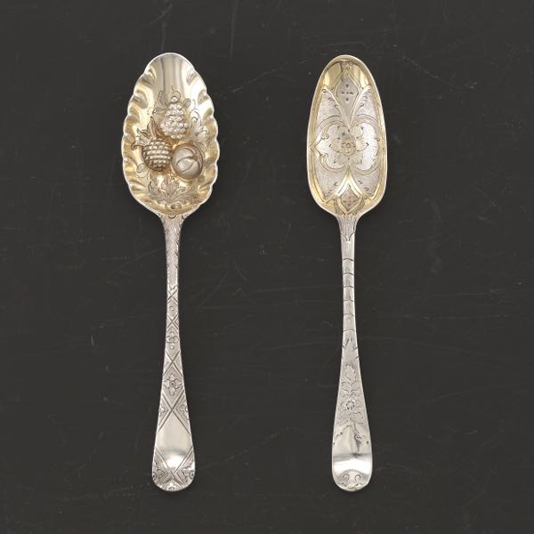 Appraisal: TWO GEORGE III STERLING SILVER GOLD WASH SPOONS LONDON DATED