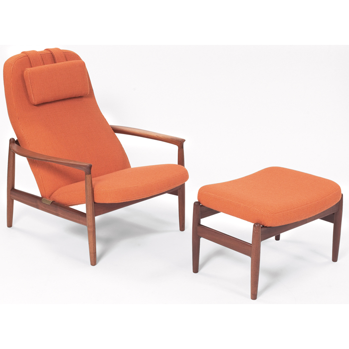 Appraisal: Dux lounge chair and ottoman Sweden walnut frame with orange