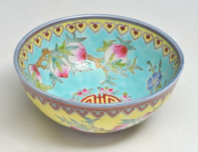 Appraisal: A CHINESE PORCELAIN TURQUOISE AND YELLOW GROUND BOWL with inscription