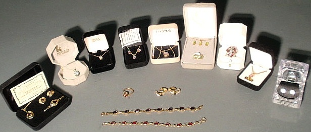 Appraisal: Group of peridot garnet amethyst etc necklaces earrings rings etc