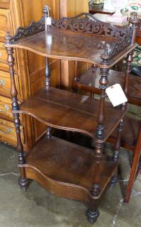 Appraisal: Late Regency rosewood three tier etegere th century having a