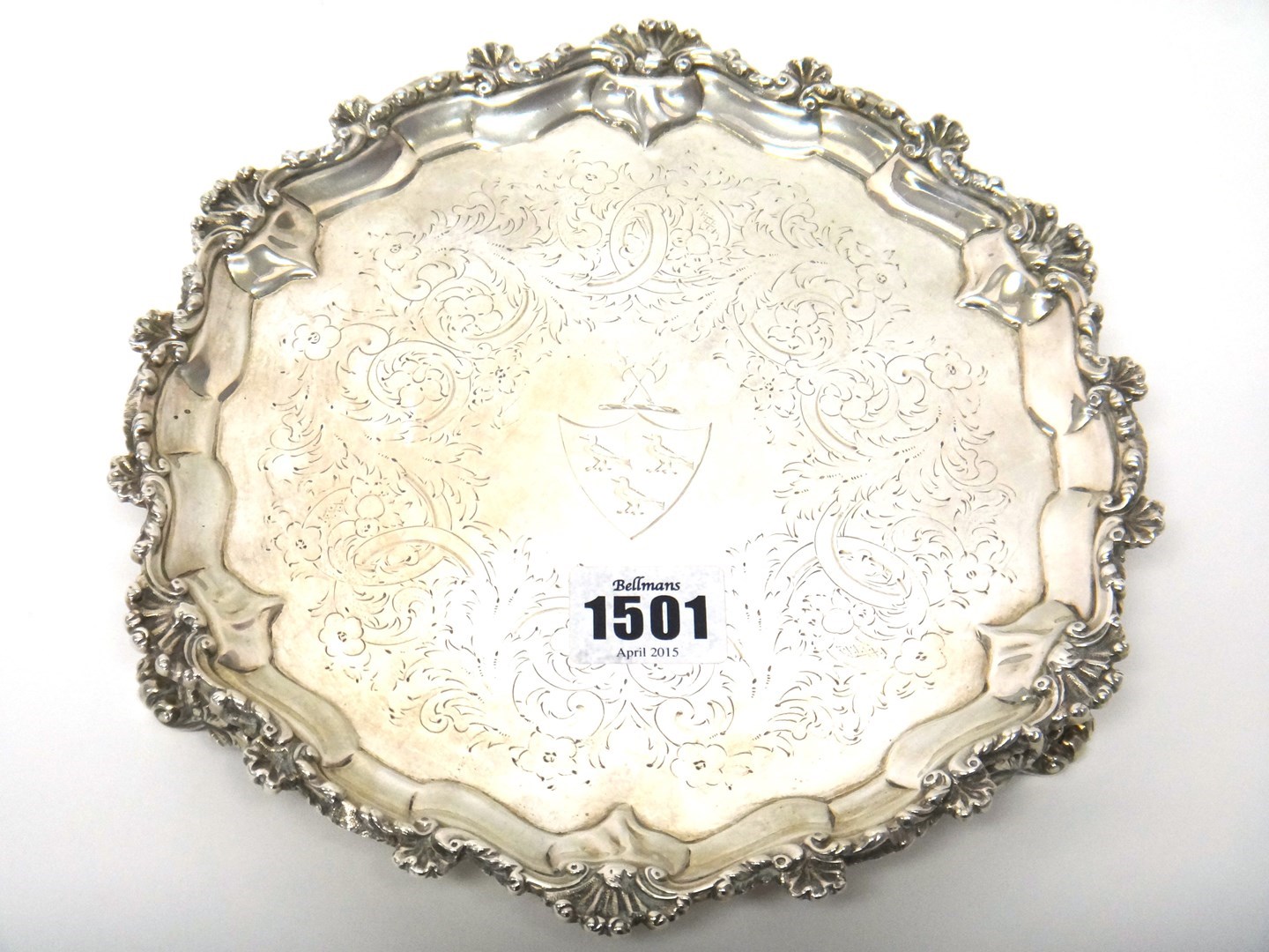 Appraisal: A Victorian silver salver of shaped circular form engraved with