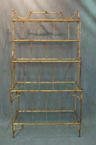 Appraisal: Gilt 'bamboo' form metal glass open etagere Central Park West