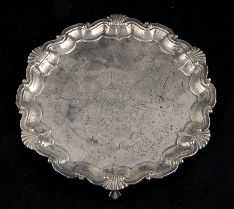 Appraisal: A silver waiter Turner Bradbury London with pie crust border