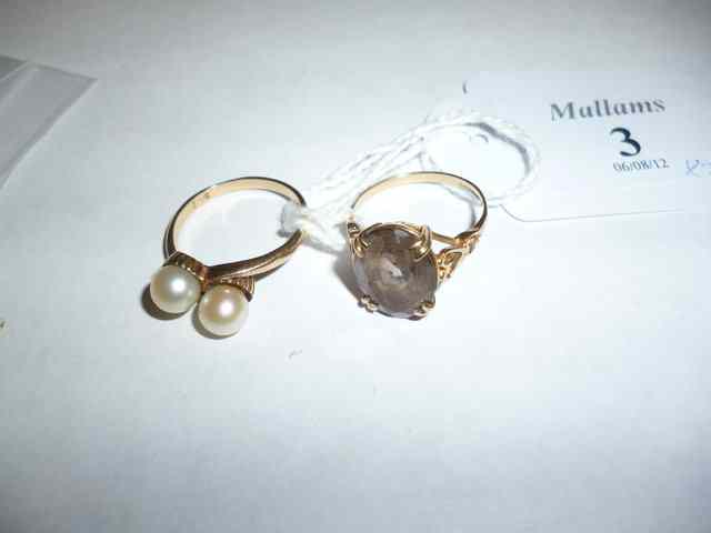 Appraisal: A CT GOLD SMOKEY QUARTZ SET RING together with a