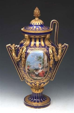 Appraisal: A SEVRES COBALT BLUE GROUND VASE and cover vase Grec