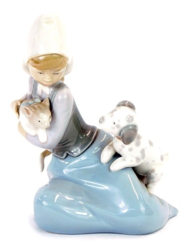 Appraisal: A Lladro porcelain figure of a girl modelled kneeling with