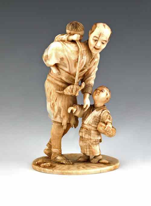 Appraisal: Japanese carved ivory figure of a gentleman with two children