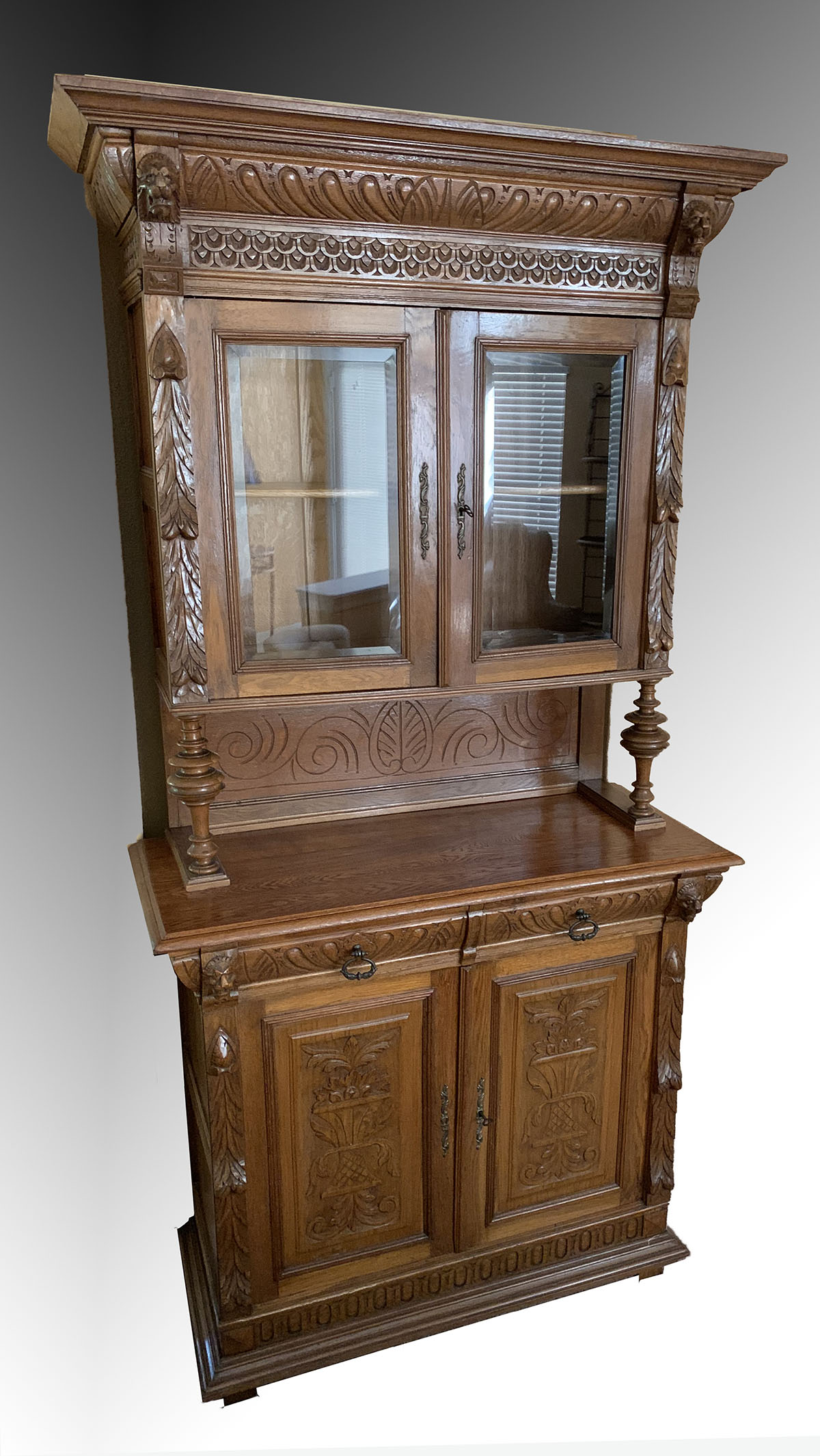 Appraisal: BELGIAN CARVED OAK STEPBACK CUPBOARD Belgian stepback cupboard having beveled