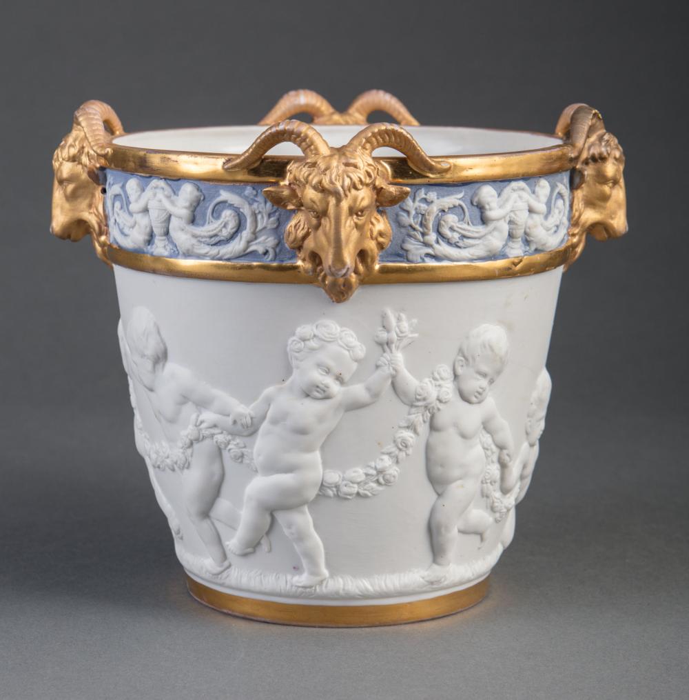 Appraisal: Sevres-Style Gilt Bisque and Glazed Porcelain Cachepot with ram's heads