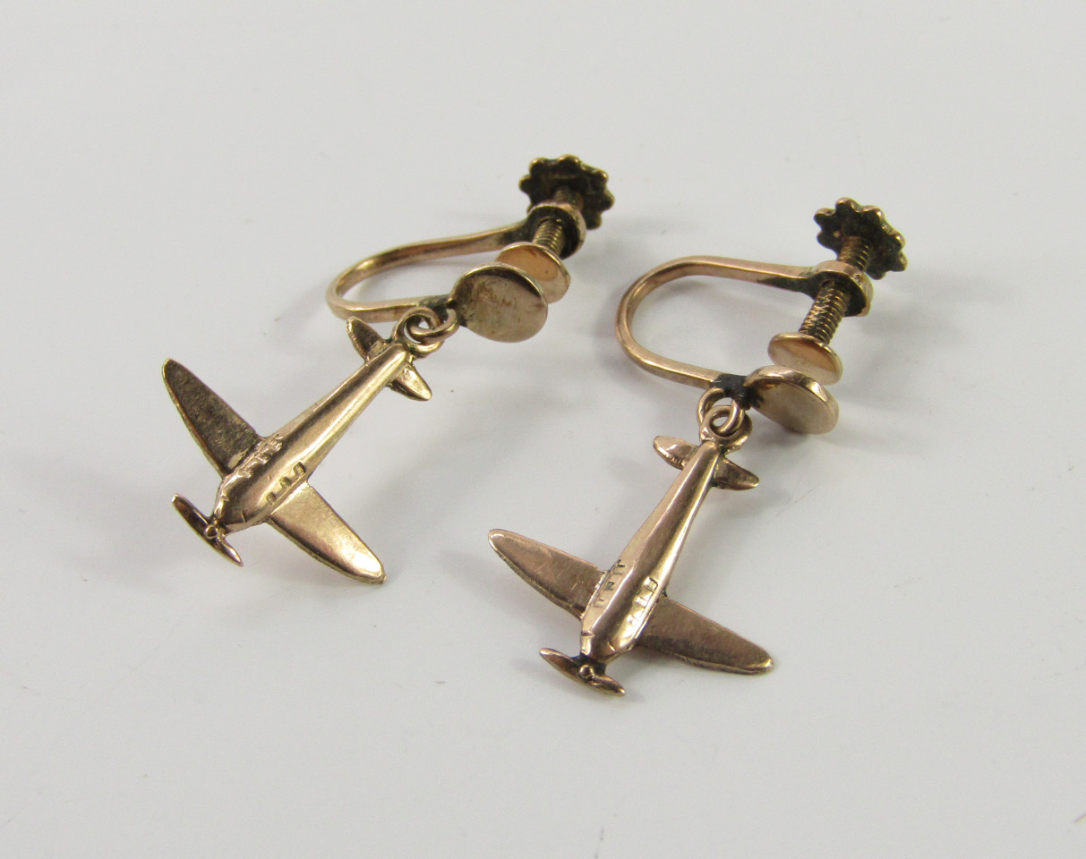 Appraisal: A pair of yellow metal earrings modelled as spitfires with