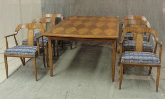 Appraisal: MASTERCRAFT Dining Table Chairs arm side Table has leaves stored