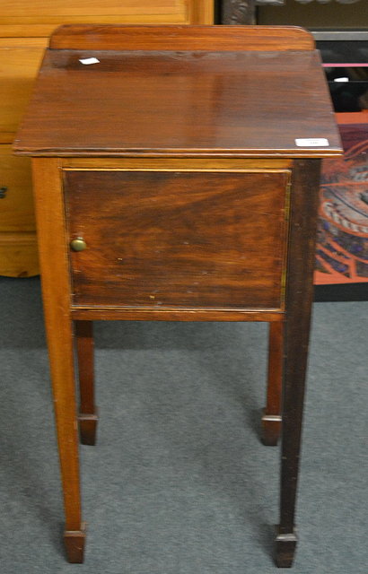 Appraisal: A mahogany small pot cupboardon tapering supports cm