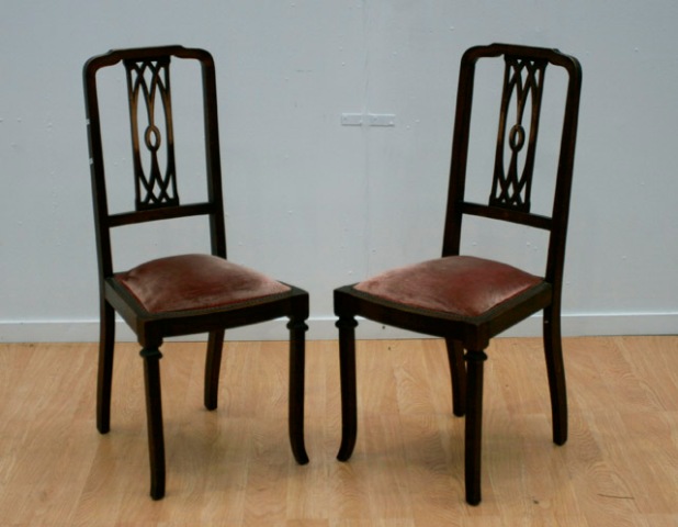 Appraisal: A pair of mid th century pink upholstered dining chairs