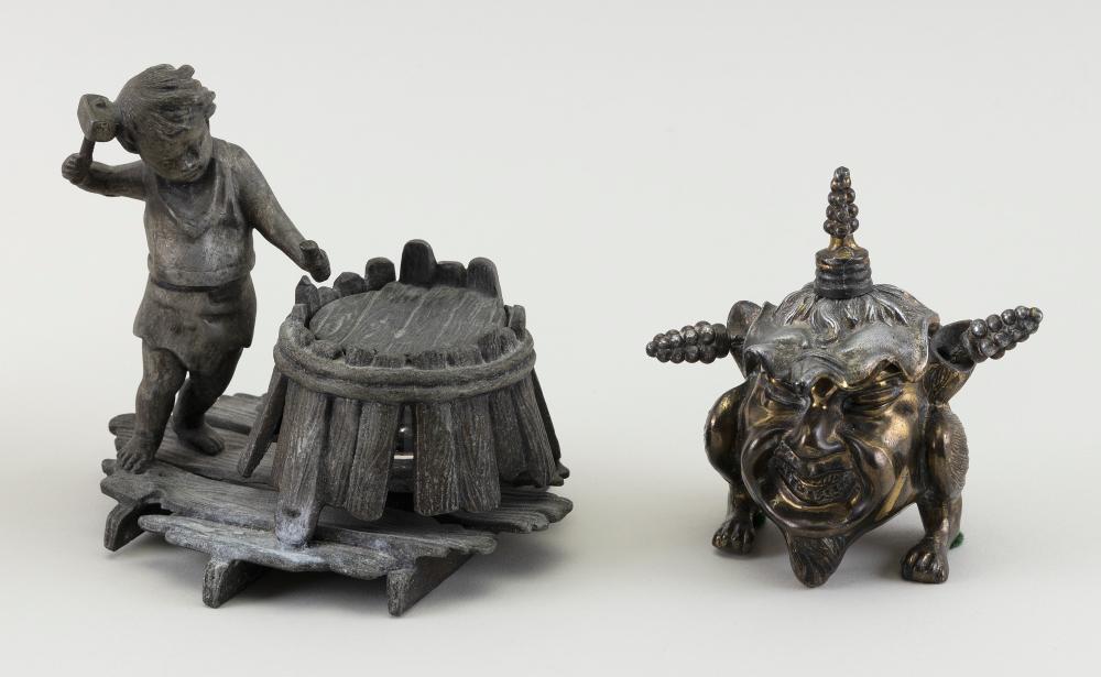 Appraisal: TWO SMALL METAL OBJECTS Early th Century Inkwell in the