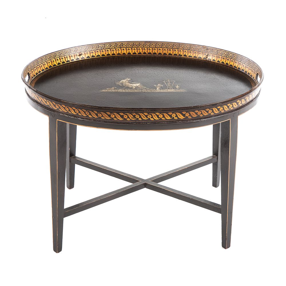 Appraisal: Edwardian Leather Top Tea Tray Table Early th century oval