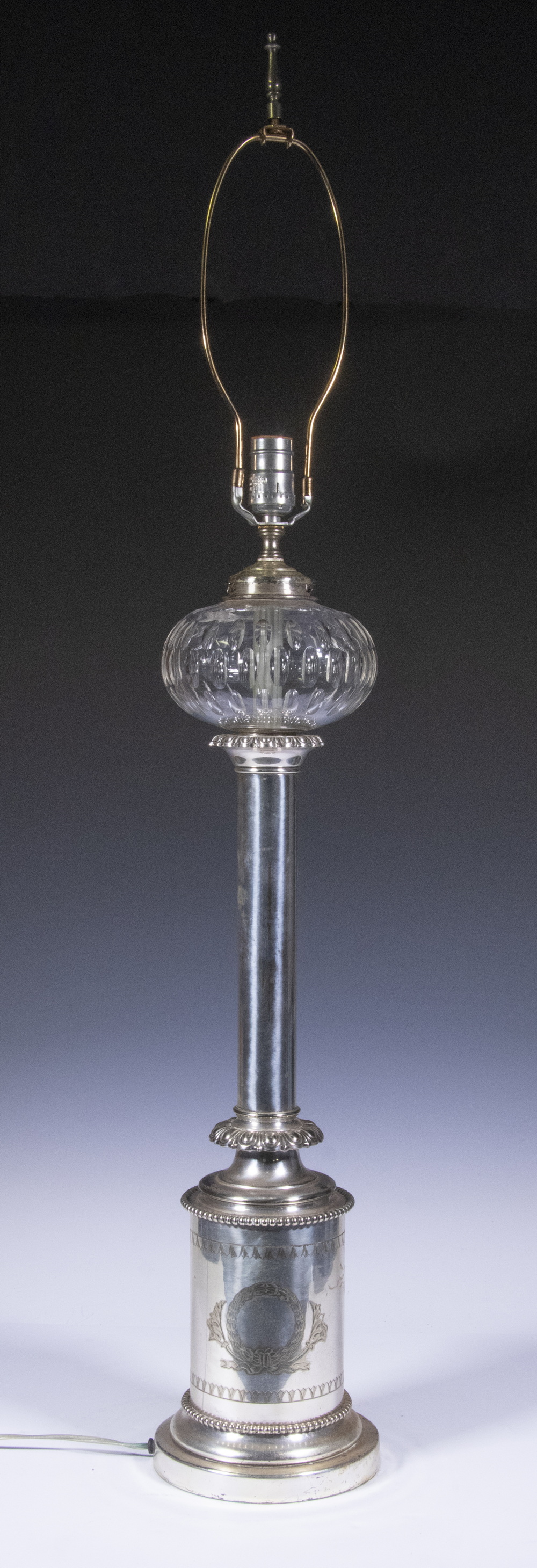 Appraisal: SILVER-PLATE CRYSTAL TABLE LAMP Electrified Late th c Kerosene Banquet