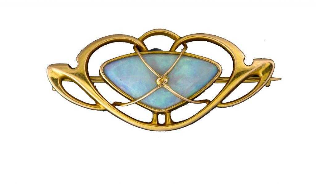 Appraisal: AN ART NOUVEAU OPAL AND GOLD BROOCH POSSIBLY DESIGNED BY