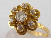 Appraisal: A yellow metal tests carat gold clear stone ring size