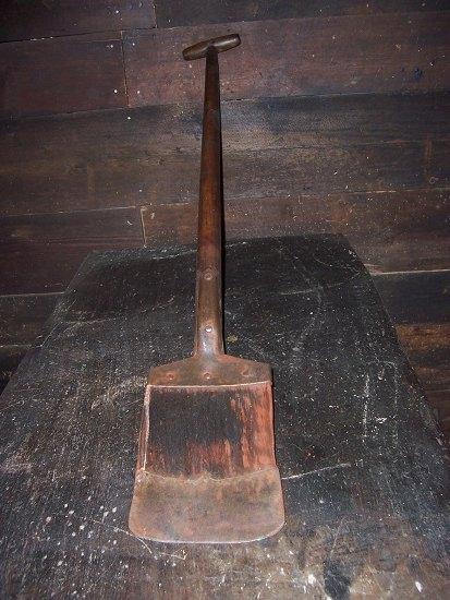 Appraisal: A fruitwood shovel with metal tip cm long