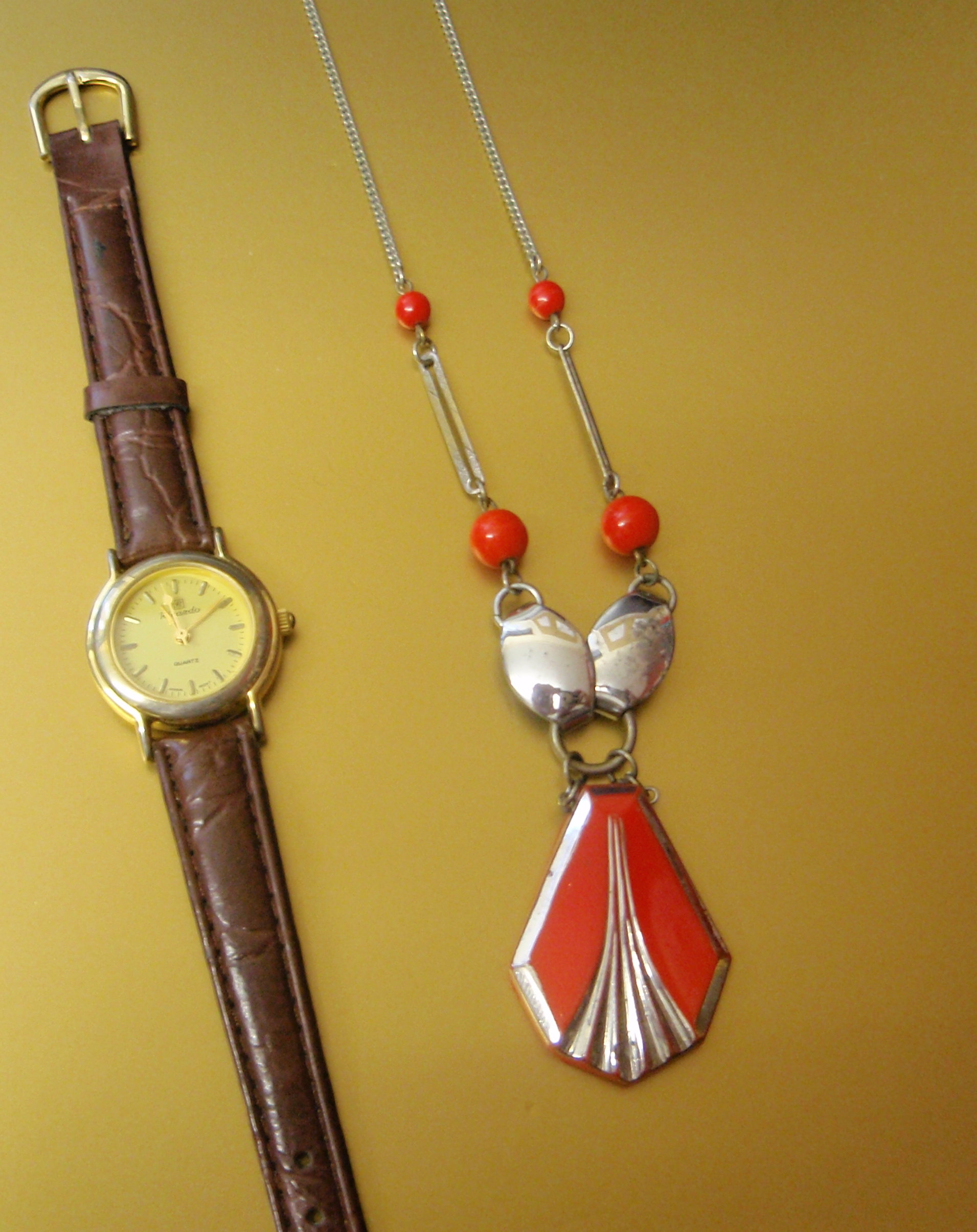 Appraisal: An Art Deco pendant and a quartz watch