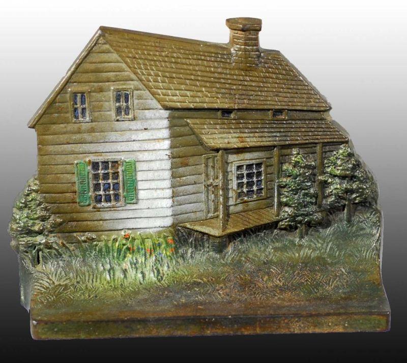 Appraisal: Cast Iron Edgar Allen Poe Cabin Doorstop Description Made by