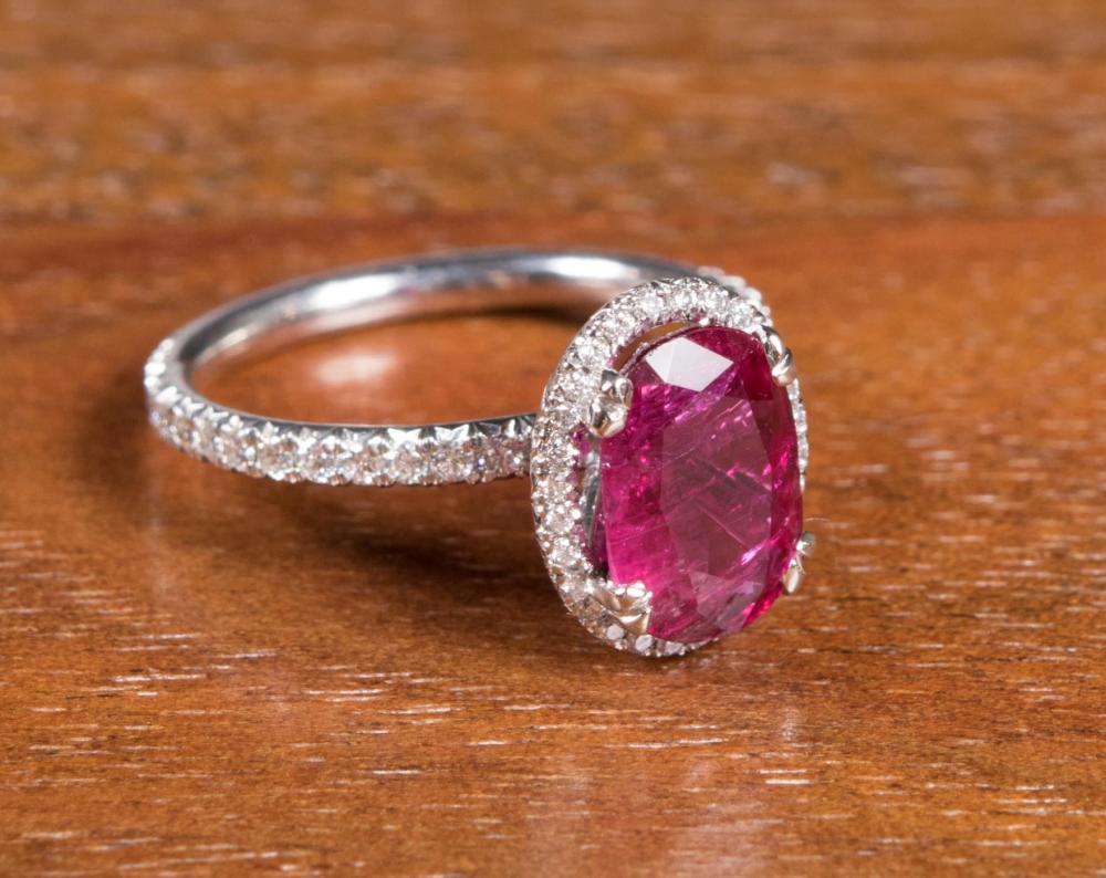 Appraisal: FINE-QUALITY RUBY DIAMOND AND PLATINUM RING with round full-cut diamonds