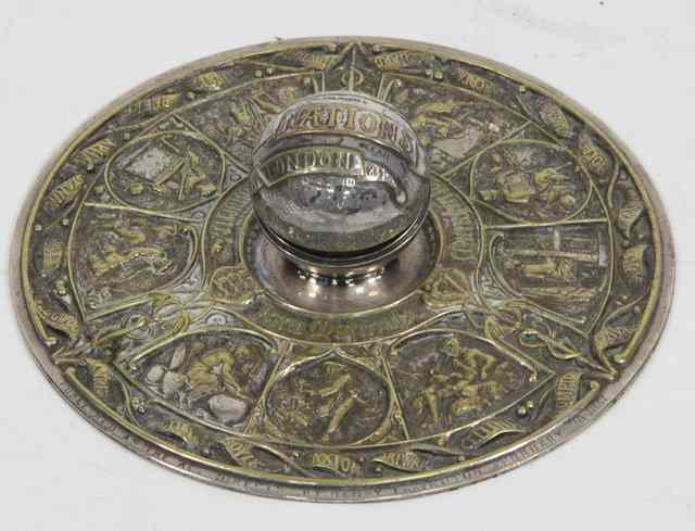 Appraisal: A circular inkstand and pen tray by Elkington commemorating The