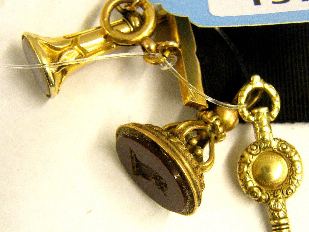 Appraisal: ct and black velvet short watch chain together with a