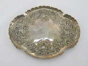 Appraisal: A late Victorian silver lobed oval dressing table tray with