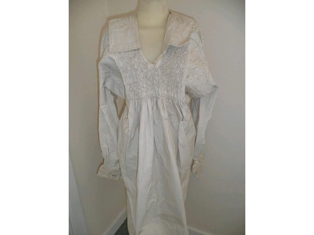 Appraisal: A vintage farmers smock with smocking detail - large