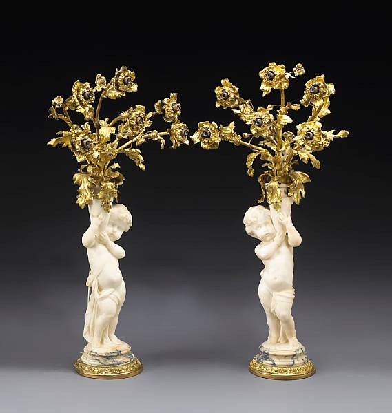 Appraisal: A pair of Belle poque gilt bronze and marble figural