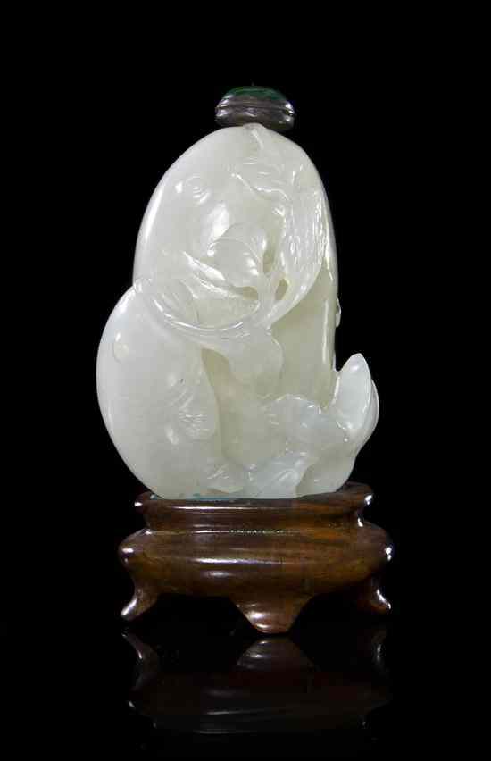 Appraisal: A White Jade Fish Form Snuff Bottle the semi-translucent stone