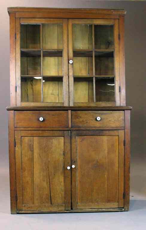 Appraisal: American Pine Step-Back CupboardVery nice pine cupboard with molded front