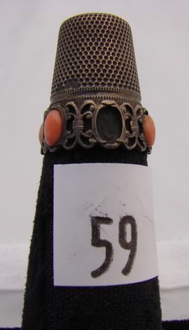 Appraisal: Thimble with peach stones on band