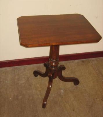 Appraisal: A VICTORIAN MAHOGANY TRIPOD TABLE the canted oblong tip up