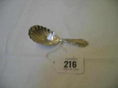 Appraisal: A VICTORIAN CADDY SPOON with shell embossed bowl London long