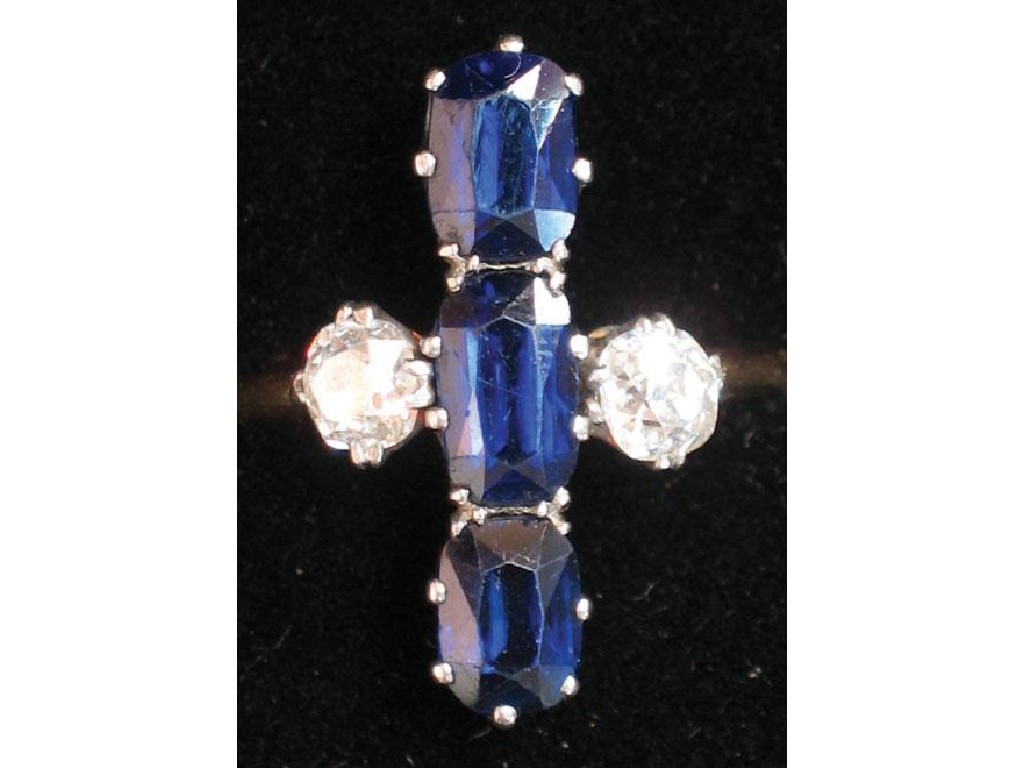 Appraisal: A DIAMOND AND SAPPHIRE DRESS RING set three vertical cushion-cut