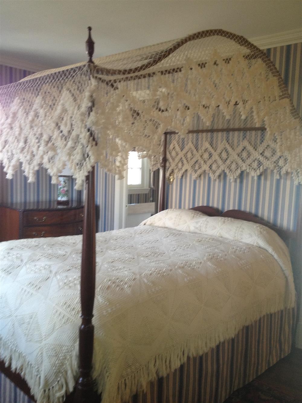 Appraisal: BIGGS FEDERAL STYLE MAHOGANY CANOPY BED serpentine arched canopy with