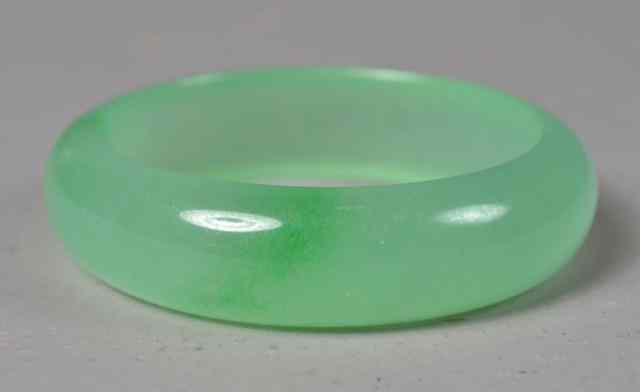 Appraisal: Chinese Jade Bangle BraceletFinely polished light green jade bangle ''