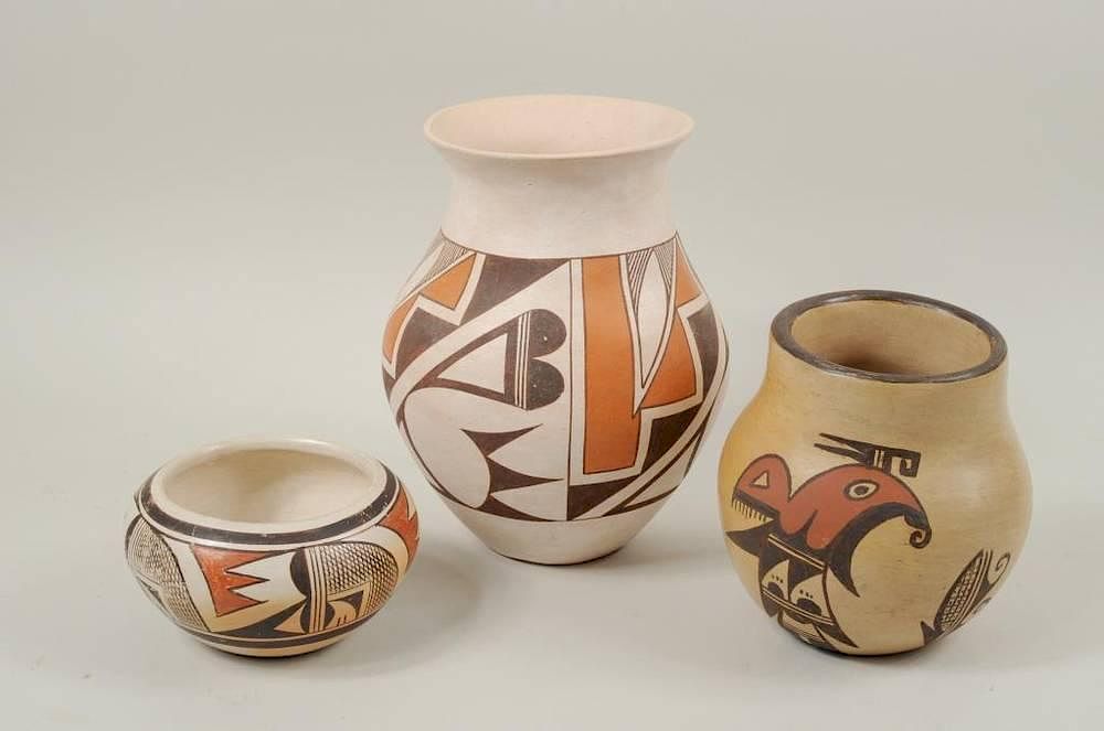 Appraisal: Two Vintage Hopi One Laguna Pot Two vintage Hopi and