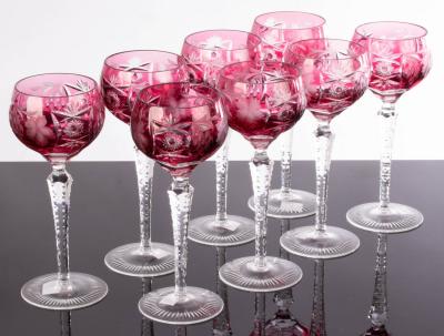 Appraisal: A set of eight wine glasses the ruby coloured bowls