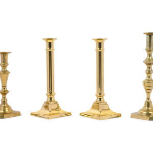 Appraisal: A Group of Brass Candlesticks th Century comprising a pair